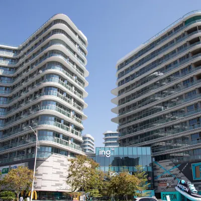 奧斯卡·ing未來印輕居（廣州奧體中心黃村地鐵站店） 广东奥林匹克体育中心附近的飯店