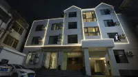 Jinyue Business Hotel Hotel dekat Eshan Stadium