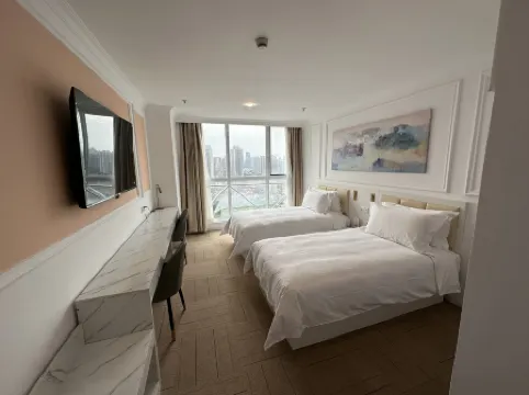 แมกนิฟิเซนท์ อินเตอร์เนชั่นแนล โฮเทล (ซินเทียนตี้ พีเพิลส์ สแควร์)