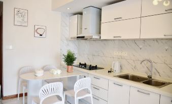 Qijiangban B&B (Huangnipound Subway Station Bauhinia Square)