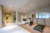 Haikou CICI Xiqi Homestay (Qilou Old Street Branch) - Fitnessstudio
