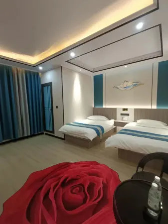 Shuangbai Yipinxiang Hotel Отели рядом с достопримечательностью «Отдел Управления охраны Уезда Чуанбэ, национальный природный заповедник Юньнань Циншань»