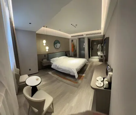 Huagang Hotel Отели в г. Сипин