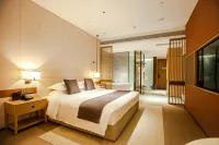 Xialian Hotel (Guangxi Dongrong Stone Calcium Carbonate Trading Center) Hotel dekat Shibashui Nature Scenic Spot