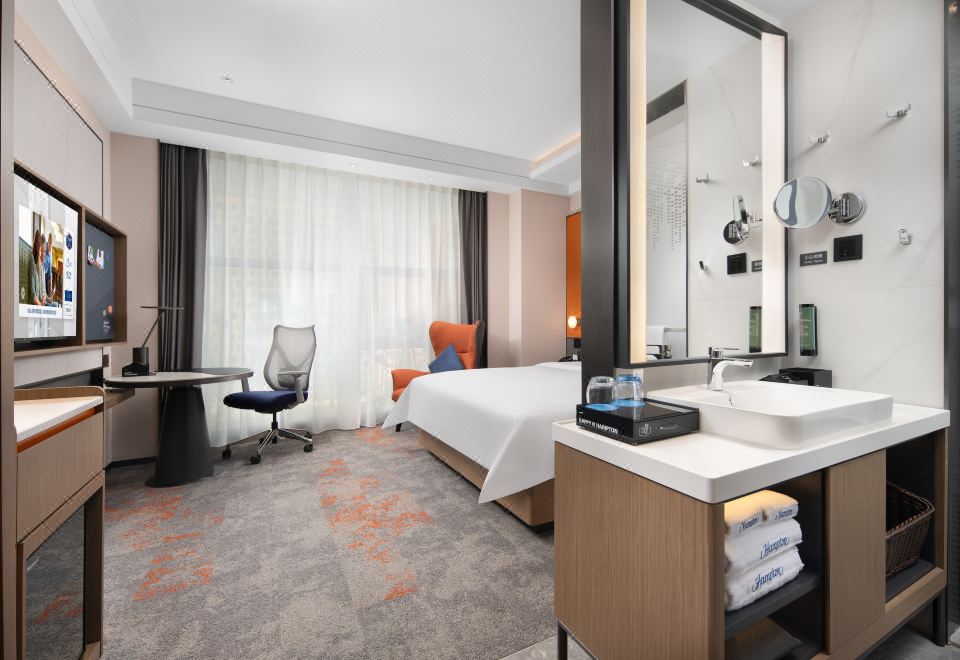 햄튼 바이 힐튼 다롄 하이테크 존의 깔끔한 객실 이미지