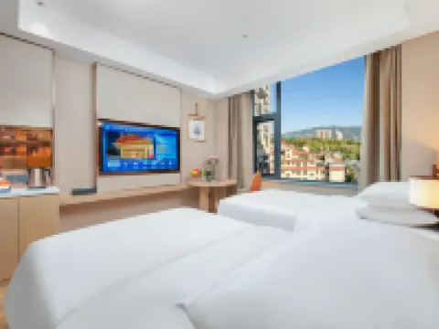 Vienna Hotel (Xuanwei Meihuan Square Branch) Hotels in Xuanwei