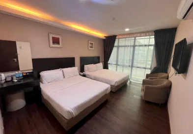 Capital O 91074 Grand World Hotel