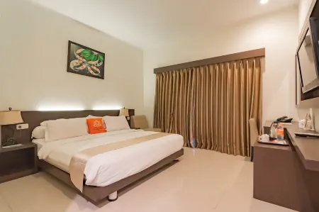 Alqueby Hotel near Kiara Artha Park & Trans Studio Mall Mitra RedDoorz