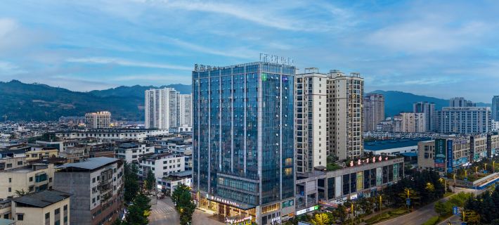 Guangzhou Jiulong Hotel (Meitan Fuyuan Building) Hotels in Meitan