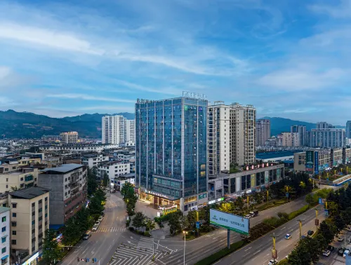 Guangzhou Jiulong Hotel (Meitan Fuyuan Building)