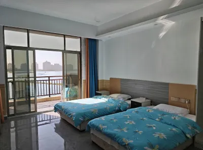 樂東丹尼酒店（佛羅鎮店） Hotels in Long Mu Wan