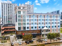 Echarm Hotel (Mengshan Bus Station) Отели в г. Меншань