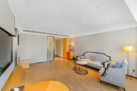 Echeng Hotel (Wuchuan Haigang Avenue Jinsha Plaza)