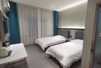 Yishi Yijia Theme Apartment Hotel (Qiqihar South Zhanqian Street)