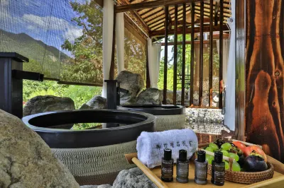 Yushu Yihuanshan Secret Land Suxi Tang Hot Spring Resort Hotel (Anji Shenxi Canyon Drifting Branch) Hotels near Anji Tianmu Mountain Drifting