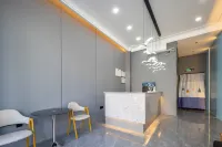 Qixin Smart Hotel (Wanning High Speed Railway Station)