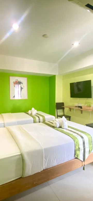 ห้องดีลักซ์เตียงแฝดพร้อมระเบียง