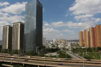 Shengxin Movie Homestay (Tongde Kunming Shopping Center Jinshang Shangzuo) 통더 쿤밍광장 쇼핑센터 호텔