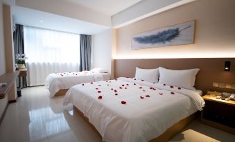 Kana Business Hotel (Zhanjiang Haitian Park Yingzhan Holiday Plaza)