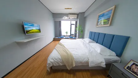 Weihai Gujie Anyi Hotel (Weigao Plaza Xingfumen) Отели рядом с достопримечательностью «Weihai Happiness Gate»