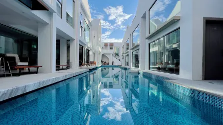 256, Huangcuo Tatou, Siming District, Xiamen City, Fujian Province Отели рядом с достопримечательностью «One Country Two Systems Beach»