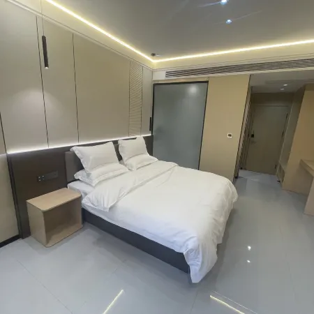 Jiulong Hotel Отели в г. Дунмин