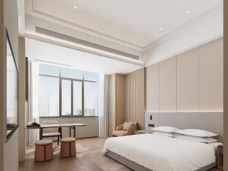 Longjie Hotel Отели рядом с достопримечательностью «Jiujiang Yangtze River Bridge»