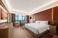 Yining Shandong Road Crystal Orange Hotel - parking