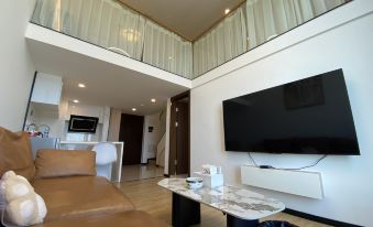 Meizhu zhengpin Loft Seaview Apartment (Longguang Century Business Center)