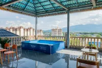Xishuangbanna Jinghong Kaiji Business Hotel (Gasa Airport High-speed Railway Branch)