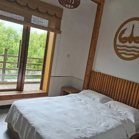 Fuyuan Hezhe Homestay (Wusu Town)