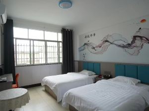 Xingguo Jiutian Business Hotel