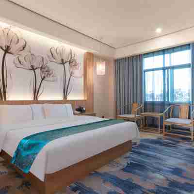 雲上四季尚品酒店（瑞麗多寶之城店） Rooms