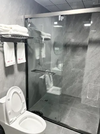 Liancheng Hexin Business Hotel Отели рядом с достопримечательностью «Peitian Ancient Village»