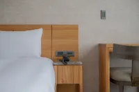 享得道行旅 In Joy Hotel