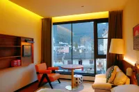 Guniujiang New Fire Inn Hotel Hôtels à proximité de : Shiwaitaoyuan Scenic Area