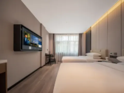 Dongyang Yaji Hotel (Baolong Plaza)