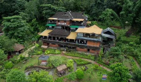 Xishuangbanna Menghai Jingxin Wellness Base Отели в г. Менхай