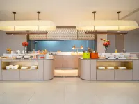Licheng Huasheng Hotel (Bachu Centery Avenue) โรงแรมในมารัลเบซี