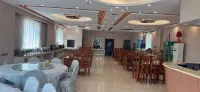 Yalinhemei Airport Hotel (Binhai International Airport Subway Station) - فطور