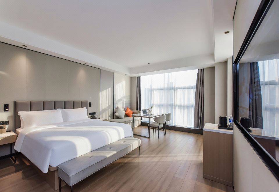 충칭 위베이 홈2 스위트 바이 힐튼 호텔의 깔끔한 로비 모습