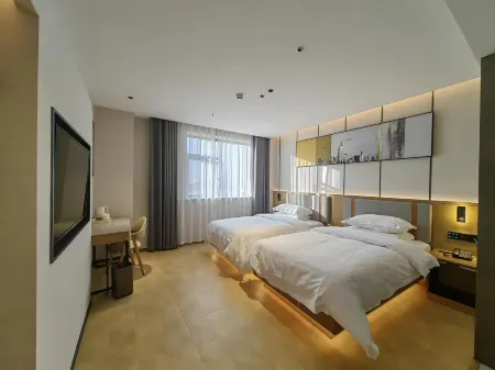 Eastern Bell Hotel Отели в г. Юйчэн