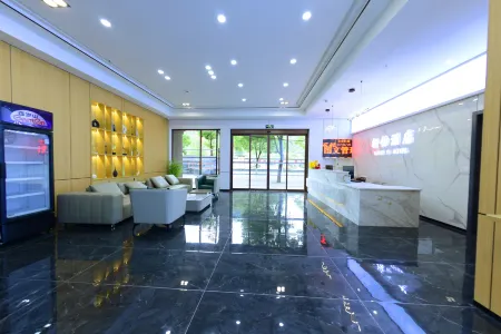 Junyi Business Hotel (Jishou Private Community Building Materials Home Furnishing Exhibition Center) Отели рядом с достопримечательностью «Jishou University»