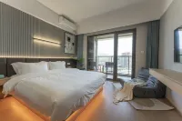 Lanxu·Sunset Seaview Vacation Bed and Breakfast (Zhujiajian Poly Zizaihai Branch) - balcony