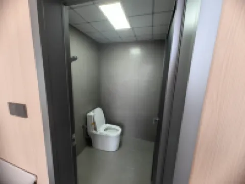 UP Huayi Hotel (Jixi Shi Railway Station Wanda Plaza)