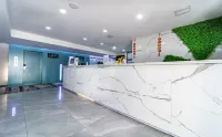 都市花園飯店（漢中寧強中心廣場三角洲夜市店）