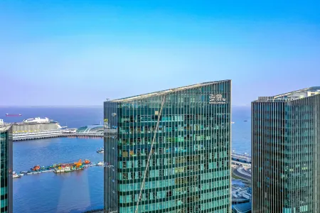 CM+ Serviced Apartment International Cruise  Terminal Shanghai Отели рядом с достопримечательностью «Shanghai Second Polytechnic University Baoshan Campus»