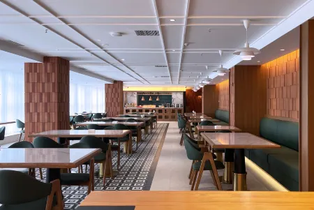 Weifang Tuyue Smanyun Hotel (huochezhan Taihuacheng) Отели рядом с достопримечательностью «Weifang Botanical Garden»