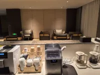 Zhaosu Warm Bay S Hotel - bar