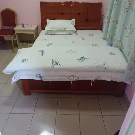 Siyi Apartment Отели рядом с достопримечательностью «Железнодорожная станция Чжанмутоу»